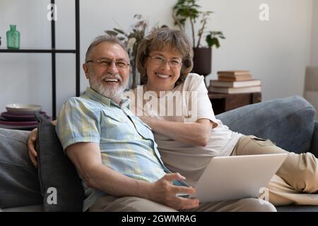 Portrait of smiling beautiful middle aged family couple. Stock Photo