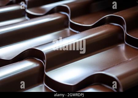 Metallic roof tile pattern background close up. Stock Photo