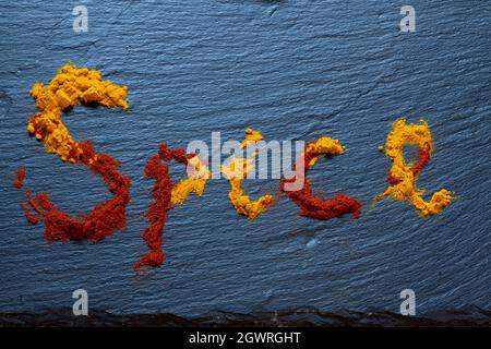 Spice written from powder spice Stock Photo