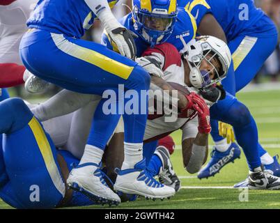 Inglewood, United States. 03rd Oct, 2021. Los Angeles Rams' defense swarm Arizona Cardinals' running back James Conner (6) during the second half of the game between the Los Angeles Rams and the Arizona Cardinal at SoFi Stadium in Inglewood, California on Sunday, October 3, 2021.The Arizona Cardinals beat the Los Angeles Rams 37-20. Photo by Michael Goulding/UPI Credit: UPI/Alamy Live News Stock Photo