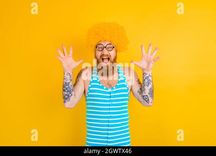 man with yellow beard,wig and glasses Stock Photo