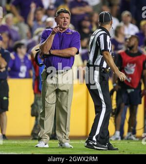 Baton Rouge, LA, USA. 2nd Oct, 2021. LSU Head Coach Ed Orgeron talks to an official during NCAA football game action between the Auburn Tigers and the LSU Tigers at Tiger Stadium in Baton Rouge, LA. Jonathan Mailhes/CSM/Alamy Live News Stock Photo