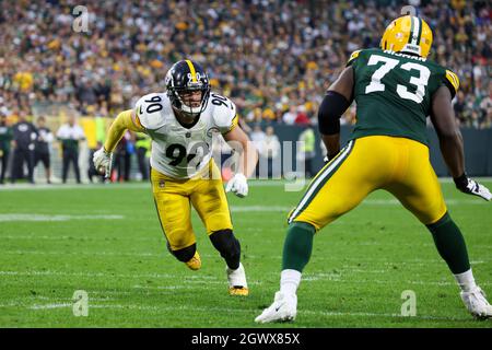 October 03, 2021: Green Bay Packers quarterback Aaron Rodgers (12) debates  a tripping call against Pittsburgh Steelers linebacker T.J. Watt (90)  during the NFL football game between the Pittsburgh Steelers and the