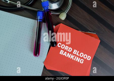 Concept of Cord Blood Banking write on sticky notes with stethoscope ...
