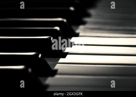 Black and white piano keys close up. Stock Photo