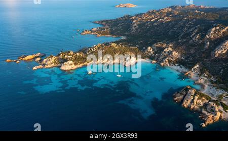 View from above, aerial shot, stunning panoramic view of Spargi Island with Cala Corsara, a white sand beach bathed by a turquoise water. Stock Photo
