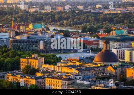 City center of Warsaw at sunset in Poland. Downtown cityscape with Pilsudski Square in the central borough of the capital. Stock Photo