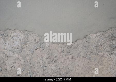 floor partially covering with self-levelling cement mortar Stock Photo