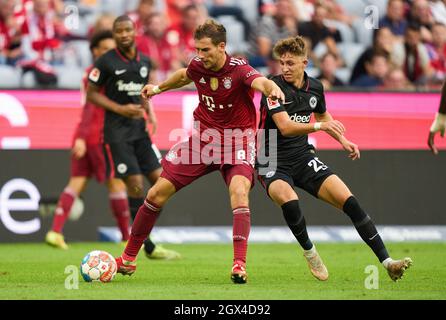 Munich, Germany. 03rd Oct, 2021. Leon GORETZKA, FCB 8  compete for the ball, tackling, duel, header, zweikampf, action, fight against Jesper Lindström, Lindstroem FRA 29  in the match FC BAYERN MUENCHEN - EINTRACHT FRANKFURT 1-2 1.German Football League on October 03, 2021 in Munich, Germany. Season 2021/2022, matchday 7, 1.Bundesliga, FCB, München, 7.Spieltag. © Peter Schatz / Alamy Live News    - DFL REGULATIONS PROHIBIT ANY USE OF PHOTOGRAPHS as IMAGE SEQUENCES and/or QUASI-VIDEO - Credit: Peter Schatz/Alamy Live News Stock Photo