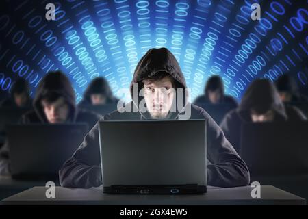 Many hackers in troll farm. Security and cyber crime concept. Stock Photo