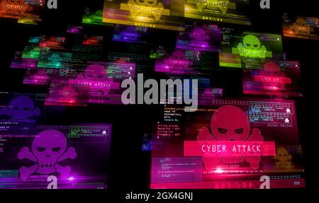 Cyber attack with skull symbol alert on computer screens. Hacking, breach security system, cybercrime, piracy and digital safety abstract concept 3d i Stock Photo