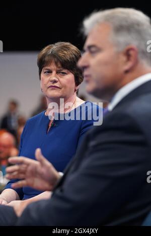 Northern Ireland Secretary Brandon Lewis and former DUP leader Arlene Foster speaking at the Conservative Party Conference in Manchester. Picture date: Monday October 4, 2021. Stock Photo
