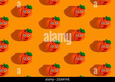 Creative orange pattern made of pumpkin, l Halloween concept Flat flat, top view, copyspace Stock Photo
