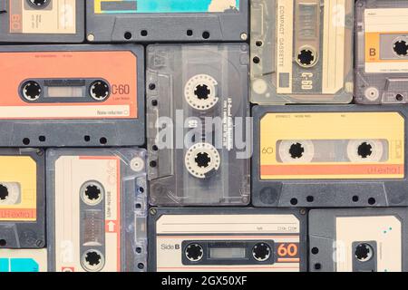 Assortment of different weathered vintage audio compact cassettes Stock Photo