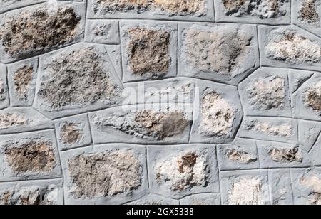 Gray rough stone cemented wall texture background. Stock Photo
