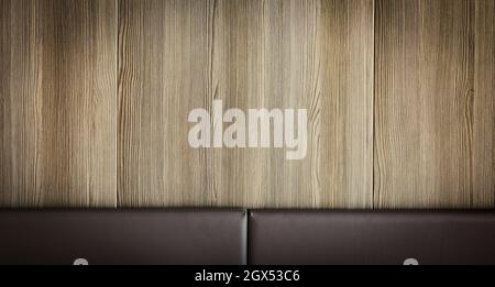 Wooden wall background with leather board. Stock Photo
