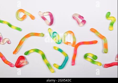Tasty jelly worms on white background Stock Photo