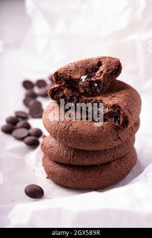Fresh homemade chocolate chips cookies with soft dark melted centre Stock Photo