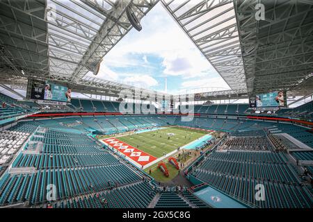 Sunday, October 3, 2019; Miami Gardens, FL USA; A general overall view of  the fifty-yard flag on the field and on the scoreboard during the National  Anthem prior to an NFL game