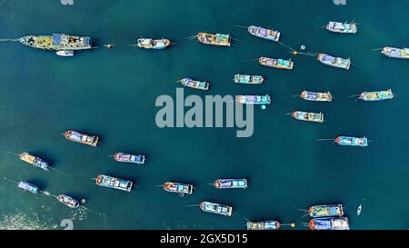 Fishing boats on the cyan sea. Aerial panoramic view Stock Photo