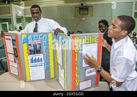 Miami Florida,Miami City Hall,Commission Chambers,High School Youth Council Presentation,public speaking,Black male boys teen teens teenagers students Stock Photo