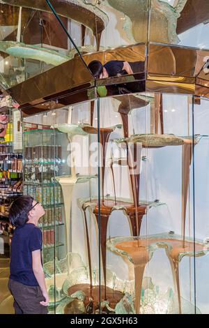 Las Vegas Nevada,The Strip Bellagio hotel casino,Jean-Philippe Patisserie,world's tallest largest chocolate fountain boy child looking watching Stock Photo