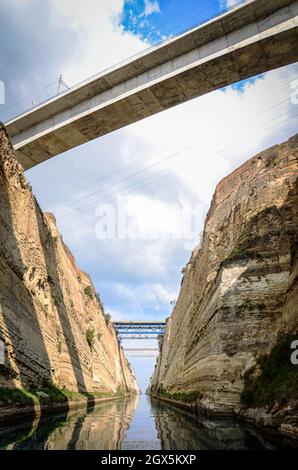 The Corinth Canal connects the Gulf of Corinth in the Ionian Sea with the Saronic Gulf in the Aegean Sea. It is mainly a tourist attraction. Stock Photo