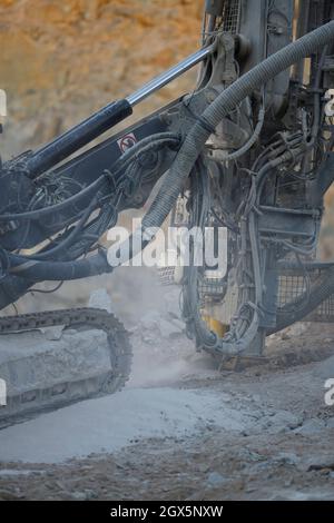 DRILLING working OVER BIG STONES Stock Photo