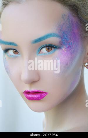 Fantasy mermaid blue glittery makeup Stock Photo