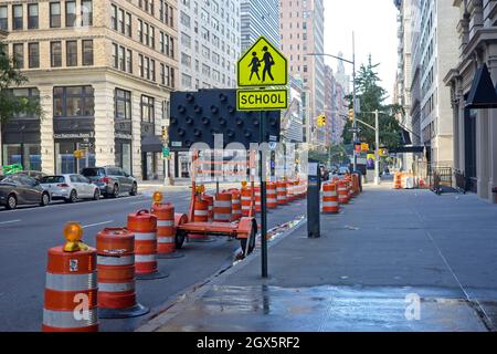 New York, NY, USA - Oct 4, 2021: Fifth Avenue partially blocked due to construction on W 15th Street Stock Photo