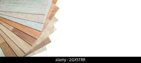 Vinyl and linoleum samples on a white isolated background. Vinyl for flooring with wood grain texture and pattern. High quality photo Stock Photo
