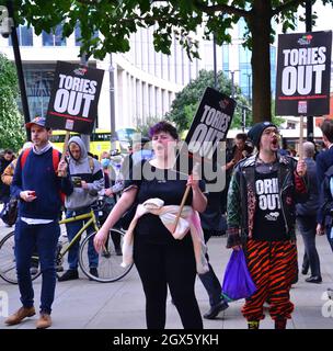 Manchester, UK, 4th October, 2021. Protesters lobby and demonstrate outside the Conservative Party Conference  in Manchester, UK. The Conference is taking place 3rd October to 6th October, 2021, at the Manchester Central Convention Complex. The event has a 'Build Back Better' slogan. It takes place against a backdrop of fuel shortages, supply problems and increasing inflation. Credit: Terry Waller/Alamy Live News Stock Photo