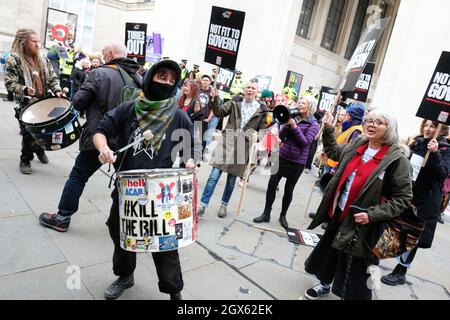 Manchester, UK – Monday 4th October 2021 – Kill the Bill and Anti Tory protesters outside the Conservative Party Conference in Manchester with Tories Out and Not Fit to Govern placards. Photo Steven May / Alamy Live News Stock Photo