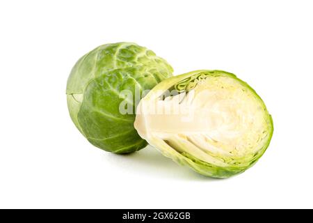 Brussels sprouts on a white background. Fresh small Brussels sprouts, cut in half, Brussels sprouts texture Stock Photo