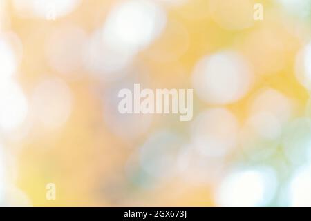 Abstract yellow warm colors background with bokeh defocused lights and shadow Stock Photo