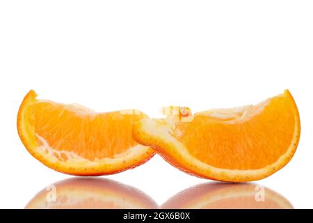 Two slices of organic ripe minneola, close-up, isolated on white. Stock Photo