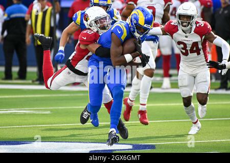 Los Angeles Rams Van Jefferson (12) tries to bring in a one-handed