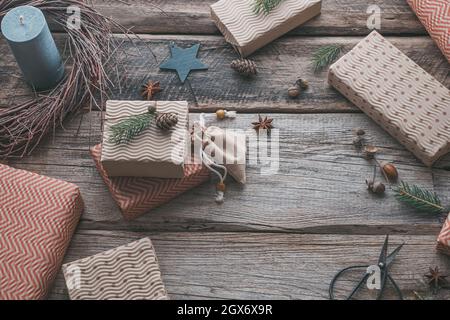 Eco style preparing for the Christmas holidays. Gift wrapping. Sustainable, plastic-free lifestyle and zero waste . High quality photo Stock Photo