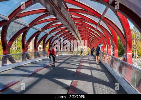 Calgary, Alberta, Canada - 27 September 2021: Inside the Peace Bridge (designed by Santiago Calatrava) in the Autumn season Stock Photo