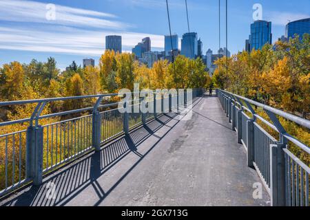 Calgary, Alberta, Canada - 27 September 2021:  Bow River Pathway between Sunnyside and Prince's Island, with Calgary skyline in background Stock Photo