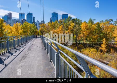 Calgary, Alberta, Canada - 27 September 2021:  Bow River Pathway between Sunnyside and Prince's Island, with Calgary skyline in background Stock Photo