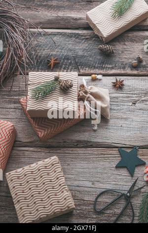 Eco style preparing for the Christmas holidays. Gift wrapping. Sustainable, plastic-free lifestyle and zero waste . High quality photo Stock Photo