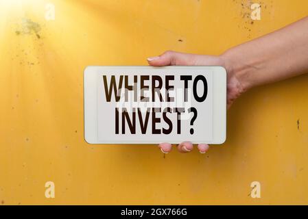 Writing displaying text Where To Invest Question. Word for asking about where put money into financial schemes or shares Voice And Video Calling Stock Photo