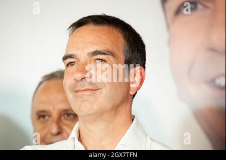 Gizzeria Lido, Italy. 04th Oct, 2021. Roberto Occhiuto (C), seen smiling after the winning the election. Roberto Occhiuto (Forza Italia, FI) wins election as new Governor of Calabria Region (Presidenza della Regione Calabria), with nearly 55% of total votes. The candidate of the Centre-Right coalition celebrated with his supporters and Antonio Tajani, Vice-President and National Coordinator of Forza Italia, at Hotel Mare Chiaro in Gizzeria Lido. (Photo by Valeria Ferraro/SOPA Images/Sipa USA) Credit: Sipa USA/Alamy Live News Stock Photo