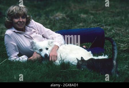 Actress Susannah York relaxes with her pet dog in the garden of her London home in May 1979. Susannah died on the 15th of January 2011 Stock Photo