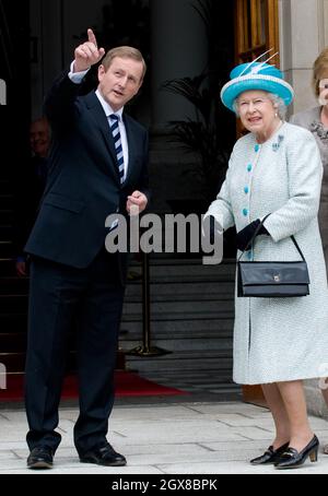 Queen Elizabeth ll meets Irish Prime Minister Enda Kenny at the Government Buildings in Dublin on the second day of a historical State Visit to Ireland on May 18, 2011. Stock Photo