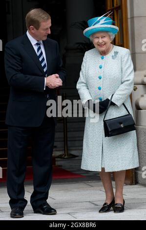 Queen Elizabeth ll meets Irish Prime Minister Enda Kenny at the Government Buildings in Dublin on the second day of a historical State Visit to Ireland on May 18, 2011. Stock Photo