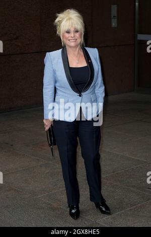 Actress Barbara Windsor visits the ICAP Charity Day in London on December 3, 2013.  Stock Photo