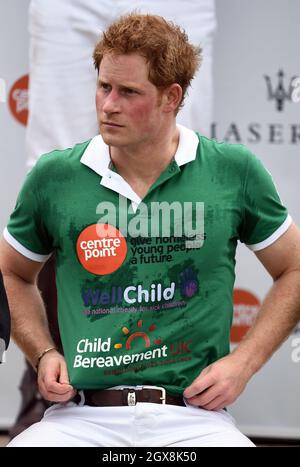 Prince Harry attends the Maserati Jerudong Trophy  charity polo match at Cirencester Park Polo Club on June 15, 2014. Stock Photo