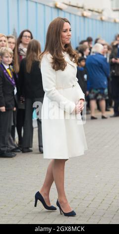 Catherine, Duchess of Cambridge, wearing a Max Mara Villar belted wool coat, visits the new home of Ben Ainslie Racing and the 1851 Trust in Portsmouth on February 12, 2015. Stock Photo